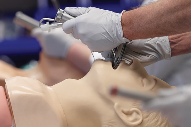 students learning advanced cardiovascular life support in certification course